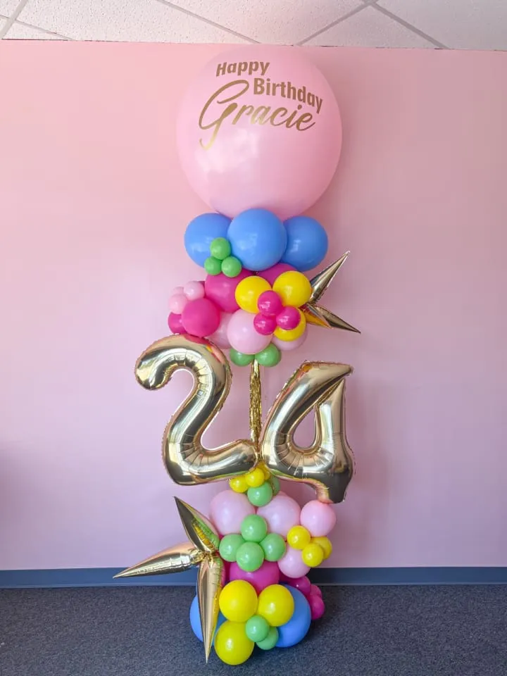 a balloon with the number twenty twenty five and a balloon with the number twenty five in the middle of it