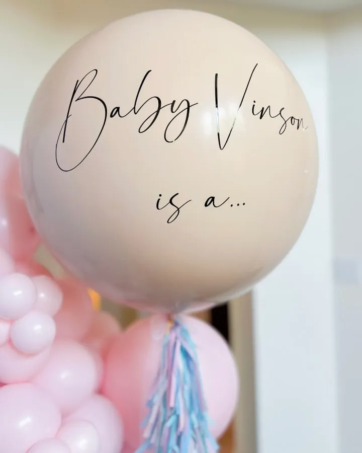 a bunch of balloons with writing on them that say baby vimos is a good thing to say to someone