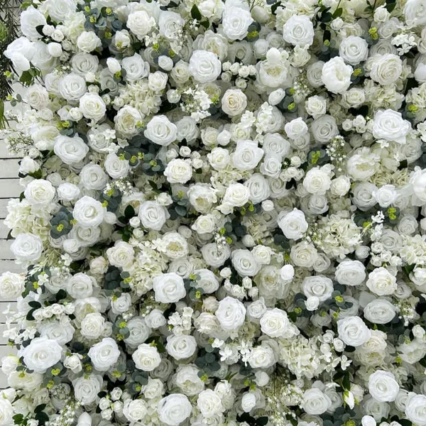 The image features a large field of white flowers, with a variety of white flowers scattered throughout the scene. The flowers are spread out across the field, creating a visually appealing and serene landscape.