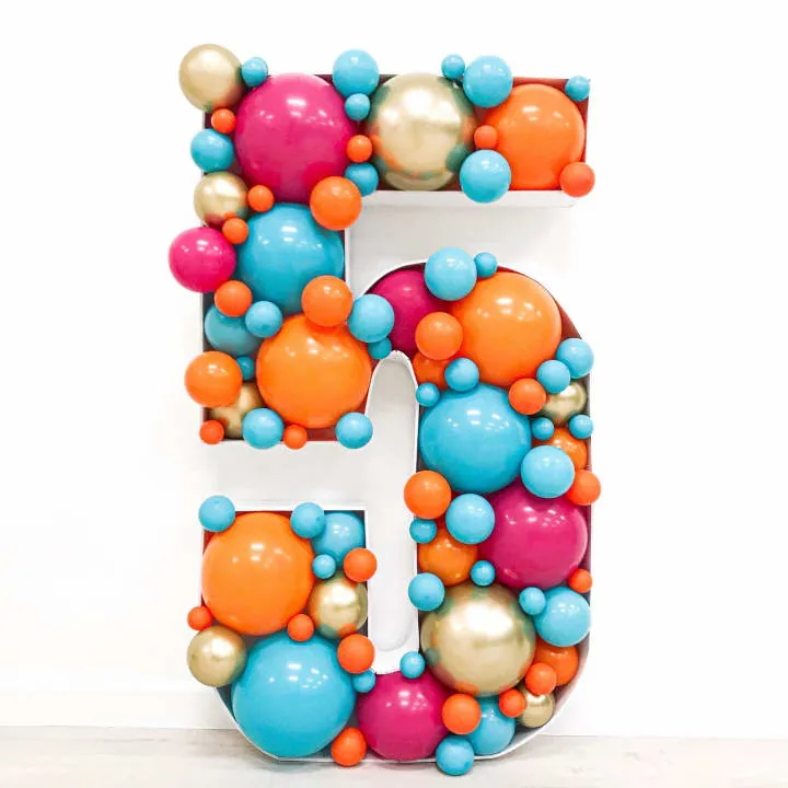 the letter e is made up of balloons and balls in the shape of the letter e on a white background
